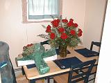 2001-08-26.wedding.kevin-nessa.engagement.flowers.table.unpacking.plymouth.mi.us.jpg