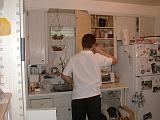 2002-05-13.humor.man_caught_putting_dishes_away.kevin-snyder.redford.mi.us.jpg