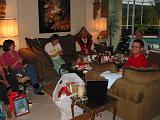 2004-12-25.opening_presents.everyone.snyder.3.christmas.venice.fl.us.jpg
