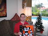 2004-12-25.opening_presents.kevin-snyder.1.christmas.venice.fl.us.jpg