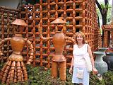 2004-07-10.tropical_gardens.pottery_figures.nessa-snyder.1.nong_nooch.th.jpg