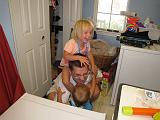 2008-08-18.helping_dad_fix.washer.08.ronan-seren-kevin-snyder.livonia.mi.us