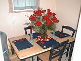 2001-08-26.wedding.kevin-nessa.engagement.flowers.table.setup.plymouth.mi.us.jpg