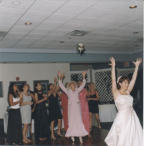 2002-05-11.wedding.kevin-nessa.reception.dance.bouquet_toss.venice.fl.us 