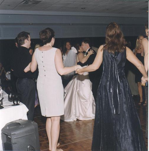 2002-05-11.wedding.kevin-nessa.reception.dance.kiss.kevin-nessa-snyder.venice.fl.us 
