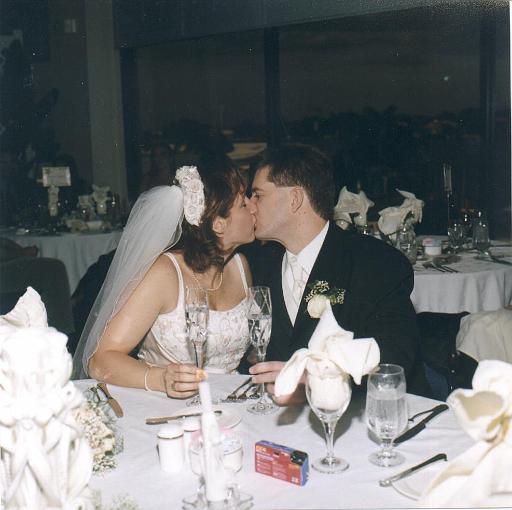 2002-05-11.wedding.kevin-nessa.reception.kiss.kevin-nessa-snyder.1.fav.venice.fl.us 