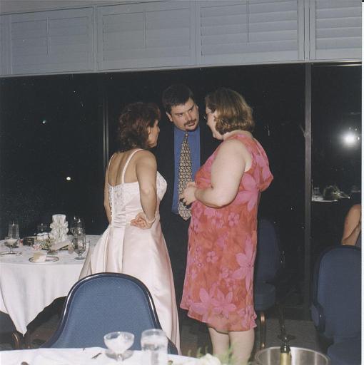 2002-05-11.wedding.kevin-nessa.reception.surrounded.erik.fav.venice.fl.us 