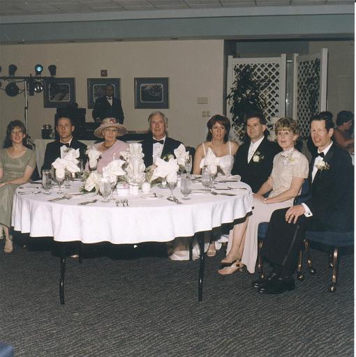 2002-05-11.wedding.kevin-nessa.reception.table.2.fav.venice.fl.us 