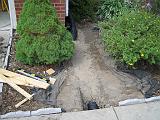 2006-07-06.gutter_downspout.adding.drain.under.sidewalk.pop_up_outlet.2.livonia.mi.us