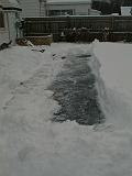 1999-01-04.pond.snow_covered.snow_half_shoveled.3.redford.mi.us.jpg