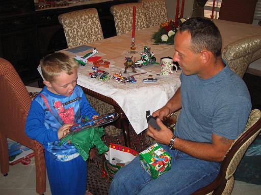 2004-12-25.opening_presents.ethan-dom.1.christmas.venice.fl.us 