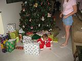 2006-12-25.opening_presents.seren-snyder.01.christmas.venice.fl.us.jpg