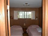 1999-08-24.bedroom.back.lake_cabin.cook.mn.us.jpg