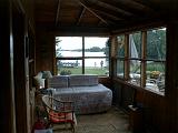 1999-08-24.porch.oma_bed.lake_cabin.cook.mn.us