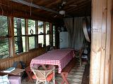 1999-08-24.porch.picnic_table.1.lake_cabin.cook.mn.us.jpg